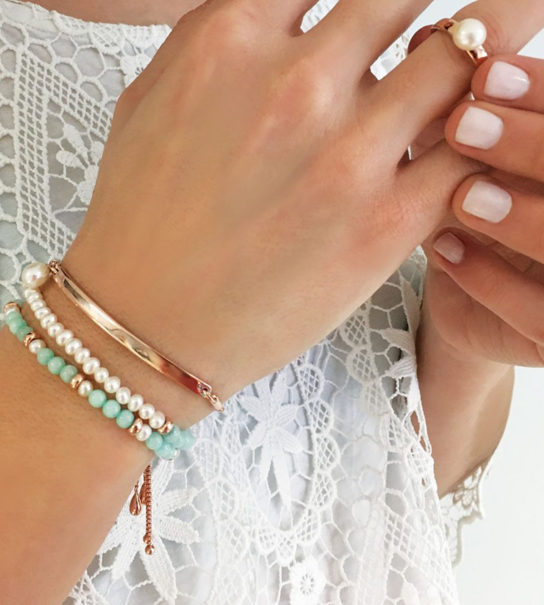 woman wearing bead bracelet by jersey pearl summer jewellery