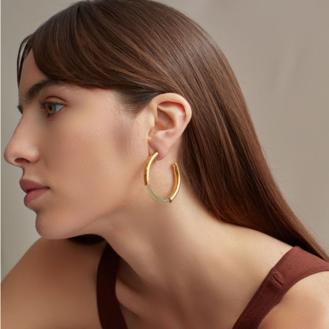 Model wearing shyla london hoops in green