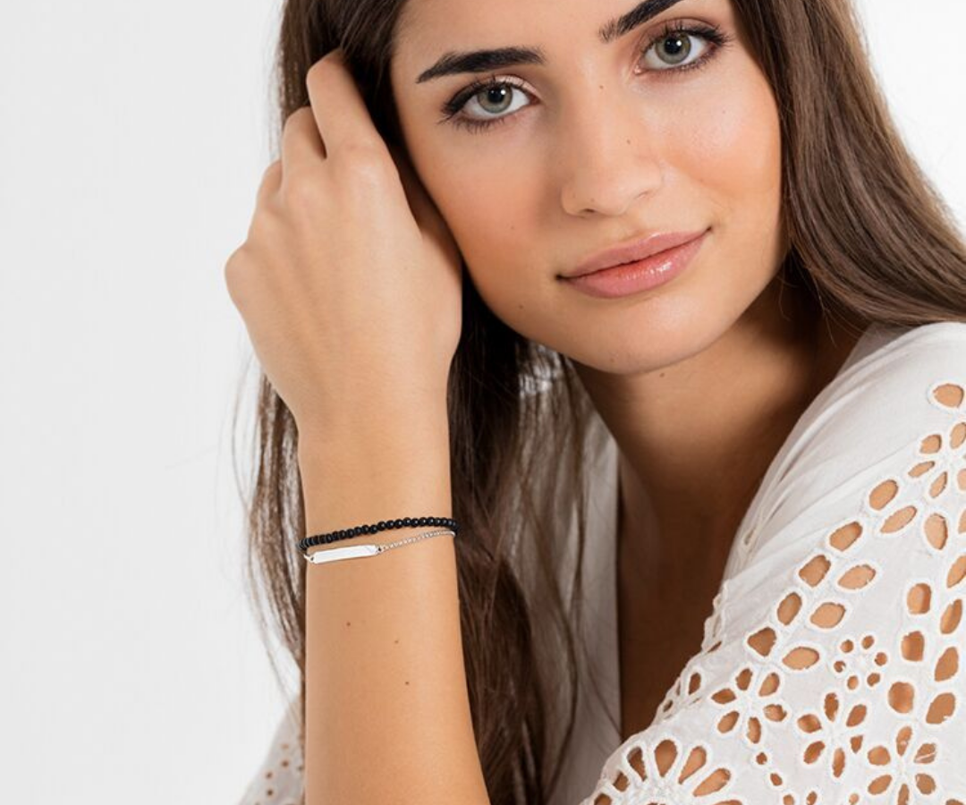 Photograph of a woman wearing a Thomas Sabo bridge bracelet to illustrate a style blog about personalised jewellery