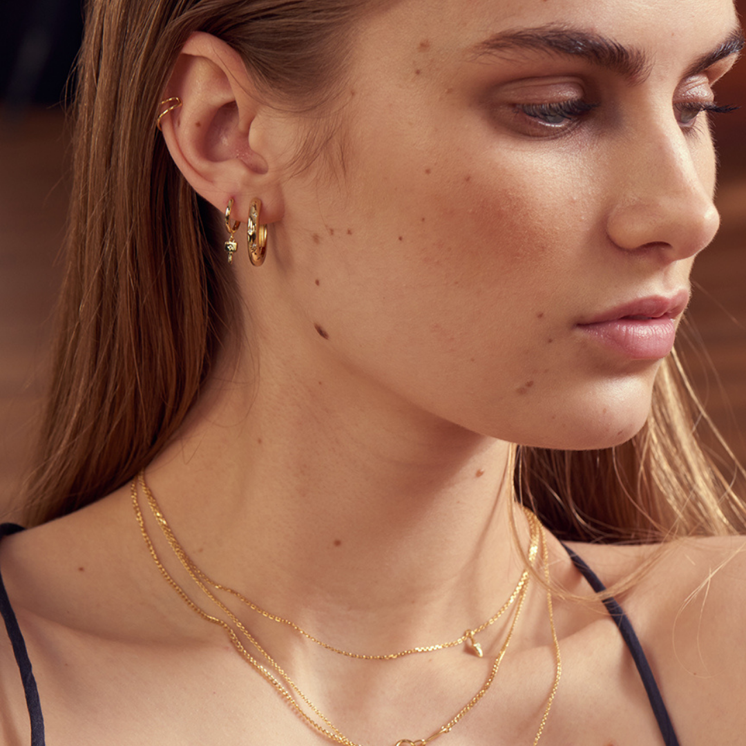 Teenage model wearing jewellery by ania haie