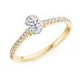 Oval cut diamond engagement ring with diamond shoulders yellow gold