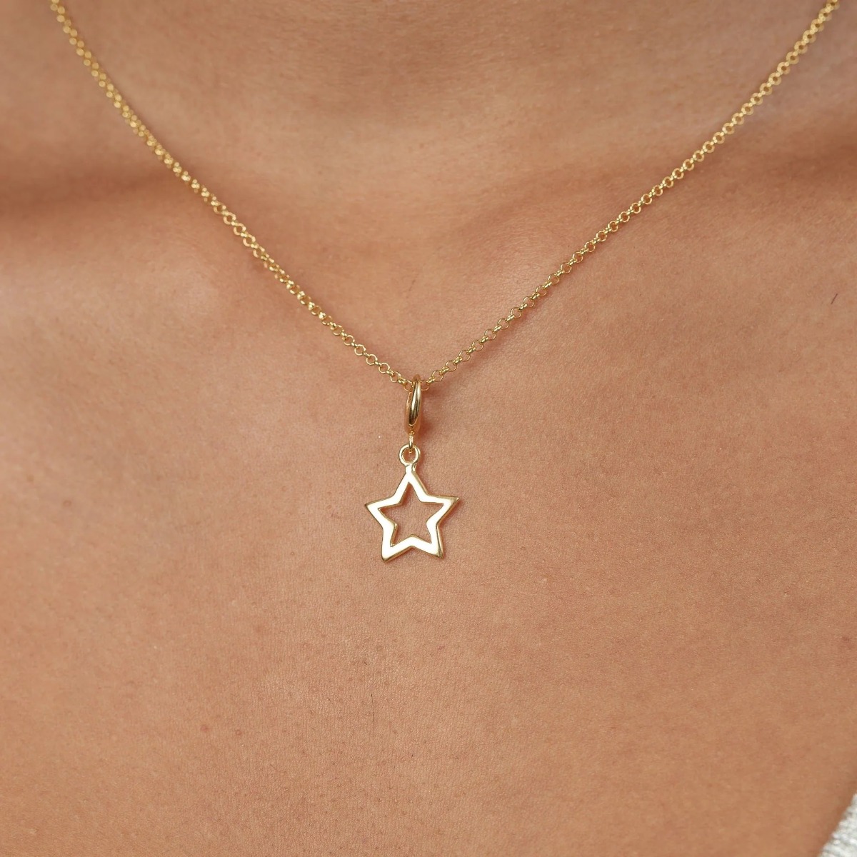 Lily Charmed Open Star Charm Gold - item number CGSO